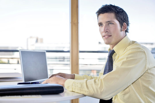 young business man at his desk