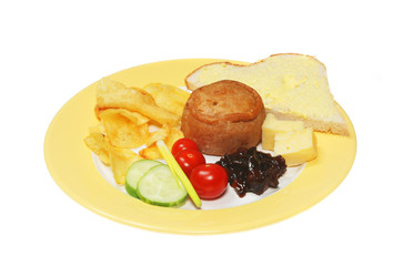 Snack food on a plate isolated on white