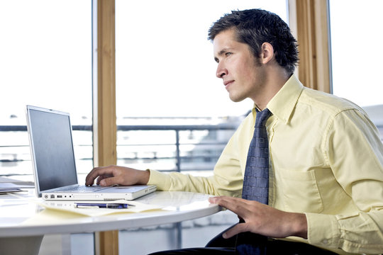 young business man at his desk