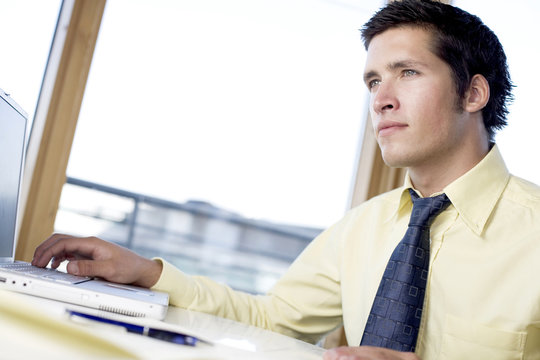 young business man at his desk