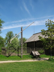 Fototapeta na wymiar Old well in country near Novgorod Russia