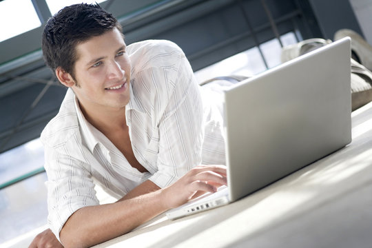 young man shopping and browsing on line