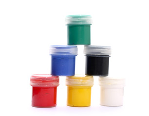 Few watercolor gouache paints in pyramid