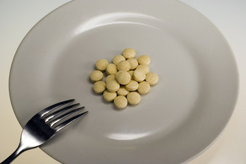 A shot of a plate with some pills