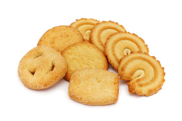 Many pieces of cookies stacked on white background.