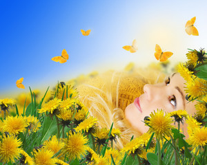 yellow butterflies and woman lying on meadow