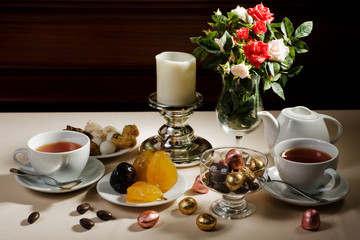 Cup of tea and sweet on a table