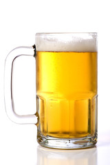 A large glass beer mug on a white background