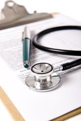 A doctor or nurses clipboard with a stethoscope