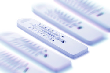 Row of Thermometers in Blue Tone