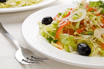 Vegetable salad - pepper, chives, lettuce and olives