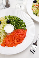 Vegetable salad - pepper, chives, lettuce and olives