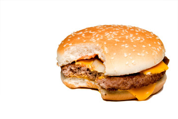 An all American classic cheeseburger on a sesame seed bun.