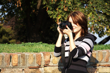 brunette with camera