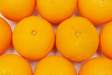 Close up of many oranges as fruit background.