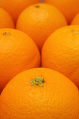 Close up of many oranges as fruit background.