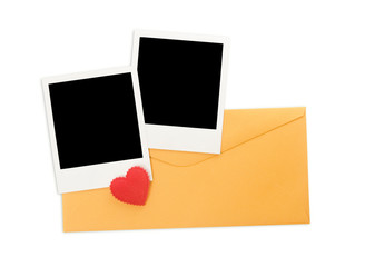 Envelope and instant photos isolated on white