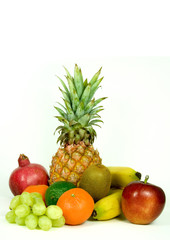 Fototapeta na wymiar Mixed healthy fruits on a white background.