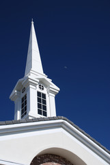 Vertical Shot of a White Church Spire