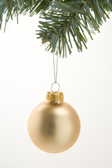 Gold Christmas Decoration Hanging From Tree