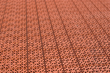 Artificial tennis court cover, brown, close-up