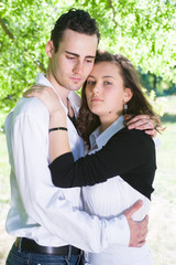 young couple flirting in the park