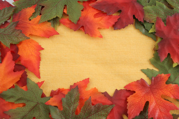 Naklejka na ściany i meble autumn leaf background or border frame