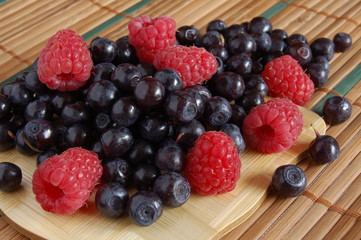 bilberries and raspberries, summer fruits