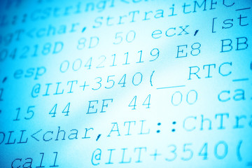 Programming code. Shallow dof blue tint.