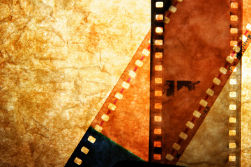 Obraz premium Processed film strips close-up over grunge background