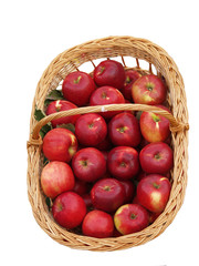 basket with delicious apples isolated