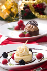 Vanilla Bean Cheesecake served with fresh raspberries