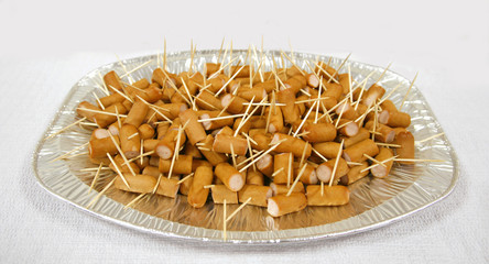 Short sausages and toothpicks and party celebration