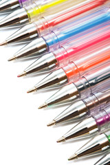 Obraz premium Color ballpoint pens on a white background