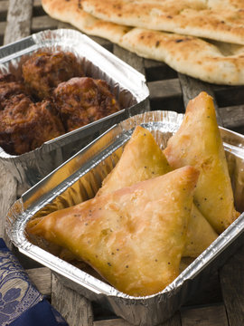 Indian Take Away- Vegetable Samosa, Naan Bread And Onion Bahji