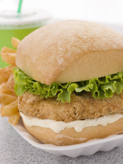 Southern Fried Chicken Fillet Burger With Fries And A Soft Drink