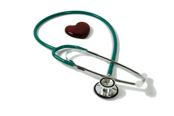 Medical stethoscope and red glass Heart