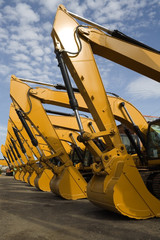 row of excavators