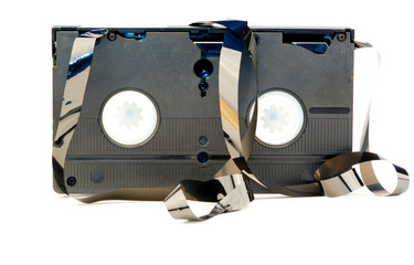 A old broken VHS tape isolated on white background
