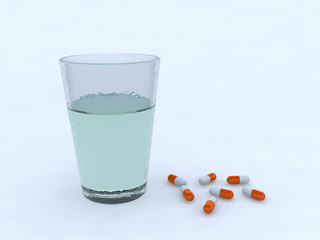 pills and a glass of water