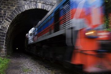 Locomotive driving out from tunnel of circumBaikal road