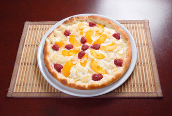 sweet pizza with fruit,Tasty Italian pizza  on plate.