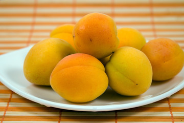 Plate with apricots
