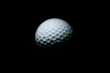 Golf ball on black