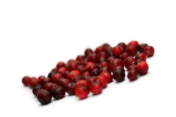 Heap of a cranberry on the white (shallow DOF)