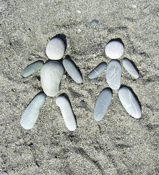 pebble couple on a sand