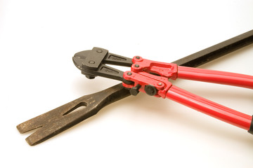 New red bolt cutters and old prybar