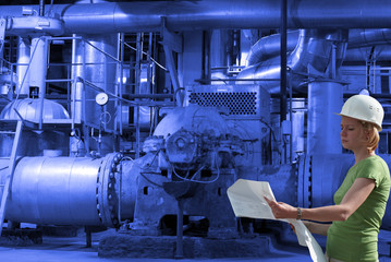 woman engineer, equipment, cables and piping