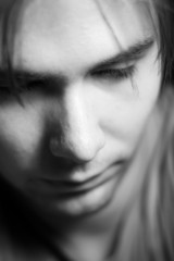 Obraz premium Thoughtful male portrait. Shallow dof. Focus on nose.