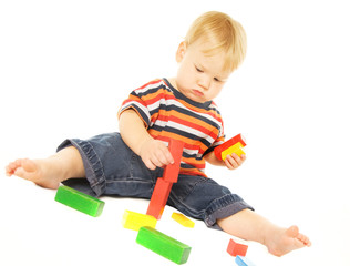 Beautiful young child playing intellectual game